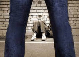 Взрослые избили подростка