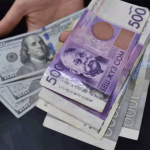 Куда приплывут доллар с сомом?