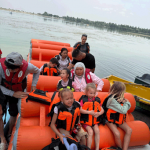 Рыболовы-спортсмены подарили детям праздник у воды